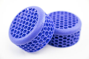 Purple round 3D-printed lattices.