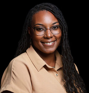 Headshot of Chenna Strange.