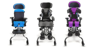 A line of LECKEY BeMe seating systems on hi-lo bases with blue, gray and purple upholstery.
